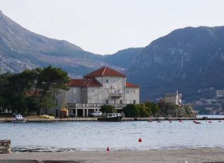 Beautiful coastal landscape of Montenegro with historic architecture and mountains.